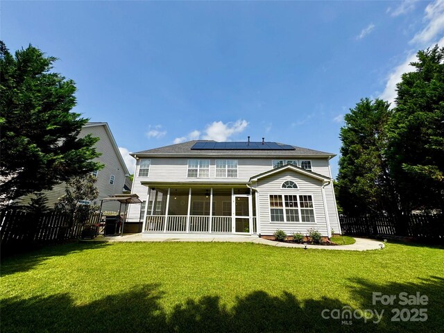 16012 Caranna Ct, Charlotte, NC 28277 - rear view of house featuring solar panels and a sunroom