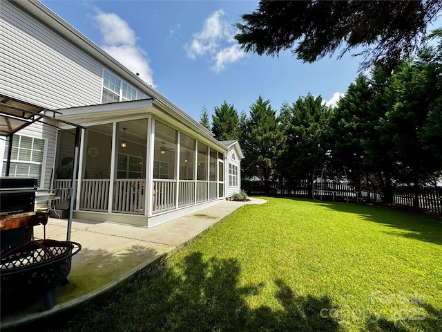 16012 Caranna Ct, Charlotte, NC 28277 - view of yard with a sunroom, a patio area, and a ceiling fan