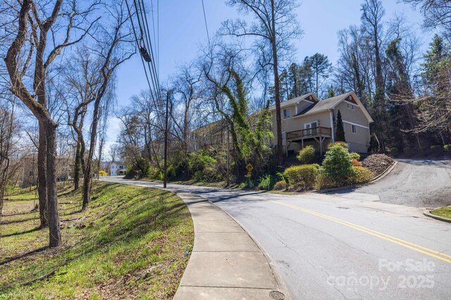 445 Sand Hill Rd Unit 1-6, Asheville, NC 28806 - view of asphalt road with sidewalks and curbs
