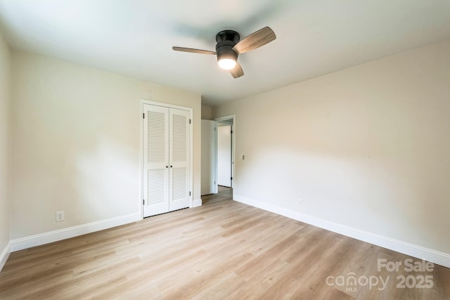 6641 Pawnee Dr, Charlotte, NC 28214 - unfurnished bedroom featuring baseboards, wood finished floors, and a closet