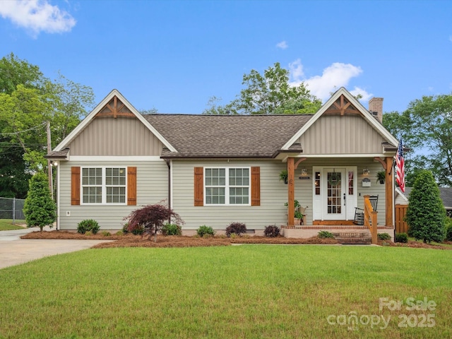 107 Pressley St, Clover, SC 29710 - craftsman-style house with a chimney, a shingled roof, and board and batten siding