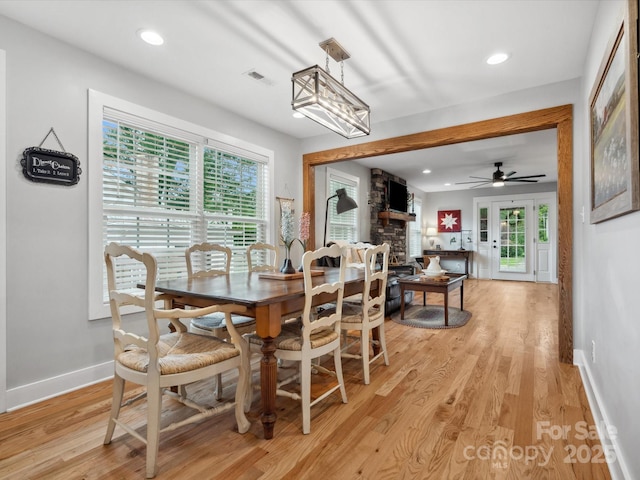 107 Pressley St, Clover, SC 29710 - dining area with a stone fireplace, healthy amount of natural light, light wood finished floors, baseboards, and recessed lighting