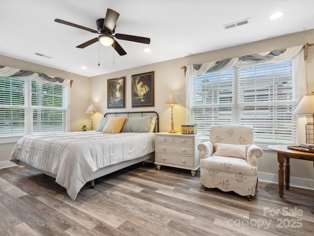 107 Pressley St, Clover, SC 29710 - bedroom with multiple windows, baseboards, wood finished floors, recessed lighting, and a ceiling fan