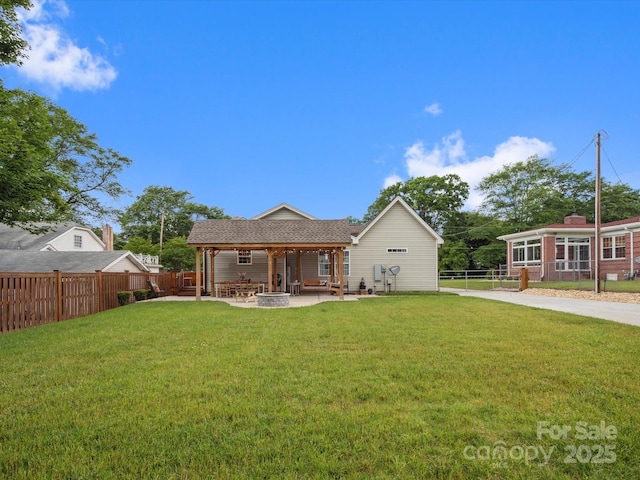 107 Pressley St, Clover, SC 29710 - back of house featuring an outdoor fire pit and a patio
