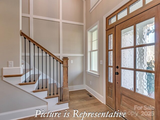 3439 Stags Leap Way, York, SC 29745 - entryway with wood finished floors, baseboards, and stairway