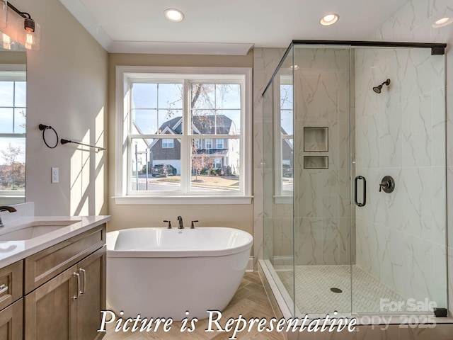 3439 Stags Leap Way, York, SC 29745 - full bath featuring healthy amount of natural light, a stall shower, recessed lighting, a freestanding tub, and vanity