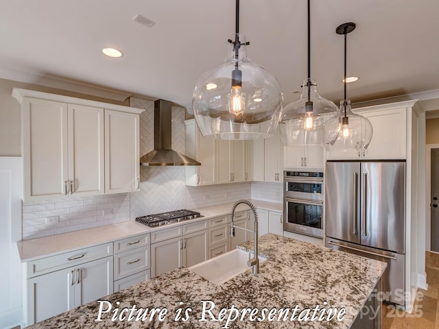 3439 Stags Leap Way, York, SC 29745 - kitchen with stainless steel appliances, wall chimney range hood, a sink, decorative backsplash, and white cabinets