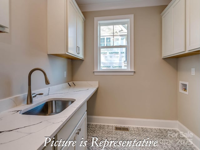 3439 Stags Leap Way, York, SC 29745 - laundry room featuring cabinet space, baseboards, and washer hookup