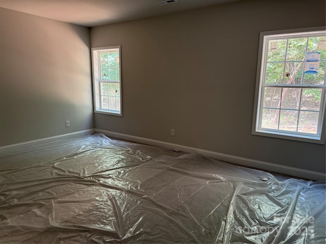 2924 Noritake Trl Unit 67, Albemarle, NC 28001 - spare room featuring baseboards