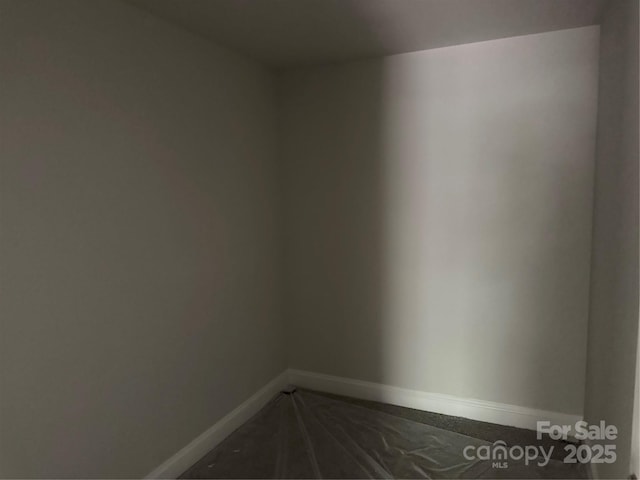 2924 Noritake Trl Unit 67, Albemarle, NC 28001 - spare room featuring baseboards