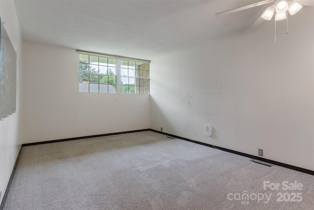 467 16th Ave NW, Hickory, NC 28601 - spare room with carpet floors, ceiling fan, and baseboards