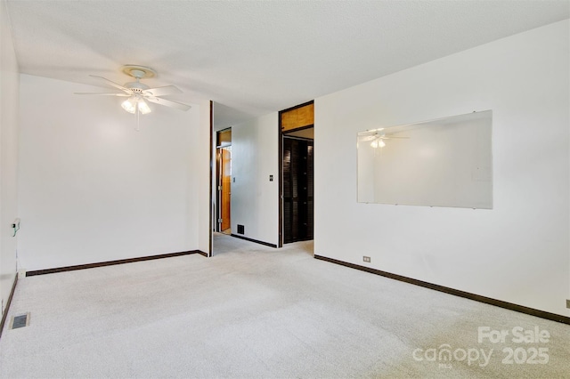 467 16th Ave NW, Hickory, NC 28601 - carpeted spare room with a ceiling fan and baseboards