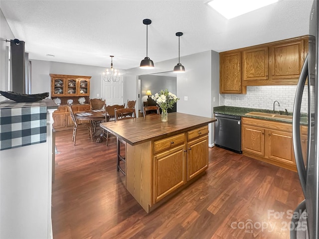 118 Harvey Vale Cir, Blacksburg, SC 29702 - kitchen with black appliances, dark wood-style flooring, a sink, wood counters, and tasteful backsplash