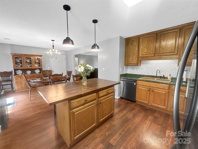 118 Harvey Vale Cir, Blacksburg, SC 29702 - kitchen with dishwasher, butcher block counters, a sink, dark wood-type flooring, and decorative backsplash
