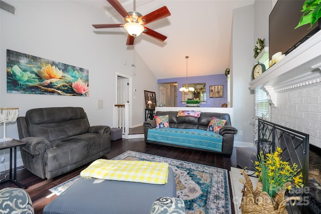 9239 N Vicksburg Park Ct, Charlotte, NC 28210 - living area featuring a chandelier, wood finished floors, ceiling fan, high vaulted ceiling, and a fireplace