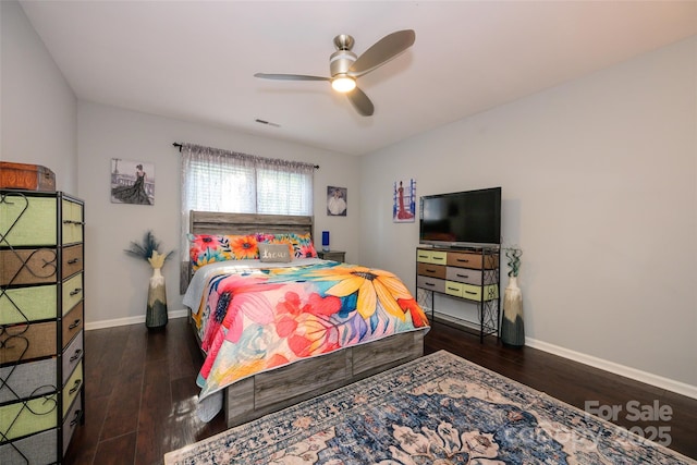 9239 N Vicksburg Park Ct, Charlotte, NC 28210 - bedroom with baseboards, wood finished floors, and a ceiling fan