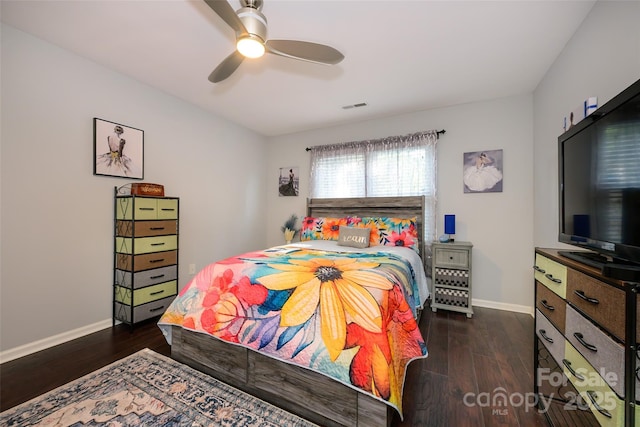 9239 N Vicksburg Park Ct, Charlotte, NC 28210 - bedroom with baseboards, wood finished floors, and a ceiling fan