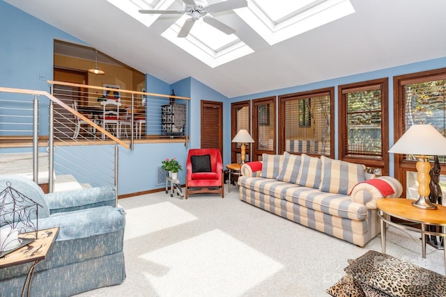 6119 Bittersweet Ln, Charlotte, NC 28270 - living area with a skylight, lofted ceiling, ceiling fan, carpet flooring, and baseboards