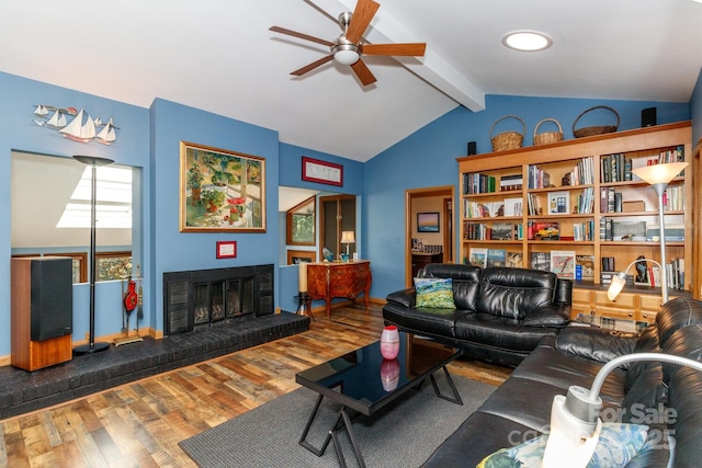 6119 Bittersweet Ln, Charlotte, NC 28270 - living area featuring wood finished floors, a ceiling fan, and a fireplace
