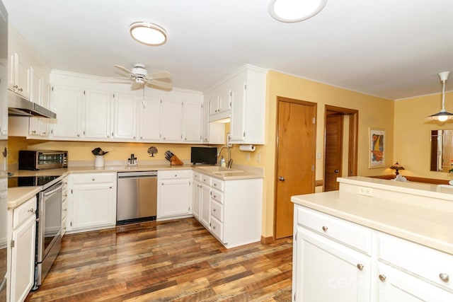 6119 Bittersweet Ln, Charlotte, NC 28270 - kitchen with stainless steel appliances, under cabinet range hood, wood finished floors, a ceiling fan, and white cabinetry