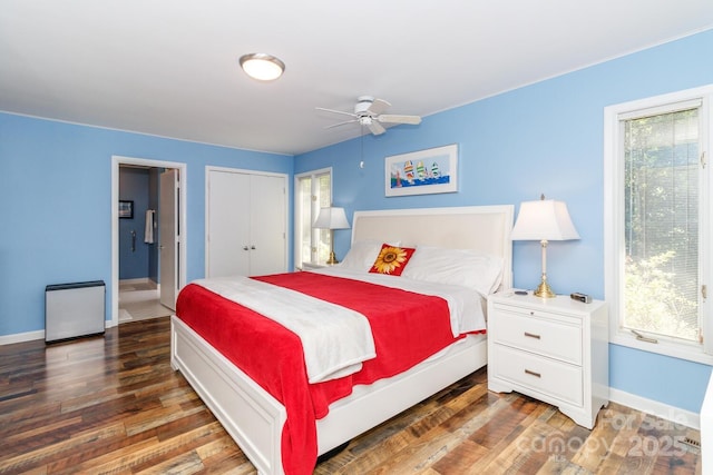 6119 Bittersweet Ln, Charlotte, NC 28270 - bedroom featuring multiple windows, baseboards, and wood finished floors