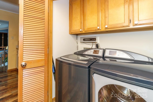 6119 Bittersweet Ln, Charlotte, NC 28270 - clothes washing area with cabinet space, wood finished floors, and independent washer and dryer