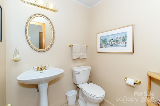 6119 Bittersweet Ln, Charlotte, NC 28270 - half bath with toilet, crown molding, baseboards, and tile patterned floors