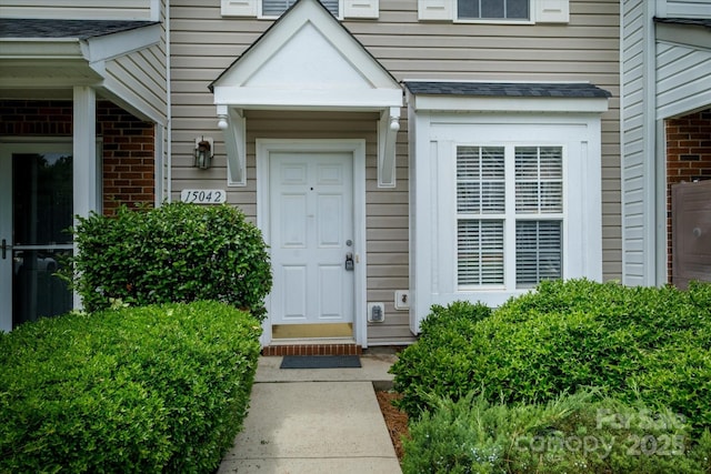 15042 Deshler Ct, Charlotte, NC 28273 - property entrance with brick siding