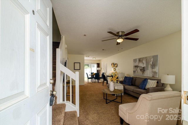 15042 Deshler Ct, Charlotte, NC 28273 - living area with stairs, carpet, ceiling fan, and baseboards