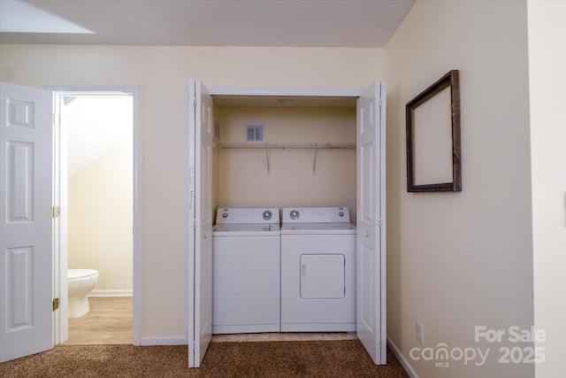 15042 Deshler Ct, Charlotte, NC 28273 - laundry room with independent washer and dryer, carpet, and baseboards