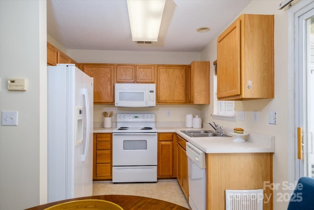 15042 Deshler Ct, Charlotte, NC 28273 - kitchen with white appliances, a sink, light countertops, and light tile patterned floors
