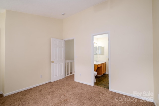15042 Deshler Ct, Charlotte, NC 28273 - unfurnished bedroom with carpet, baseboards, and ensuite bath