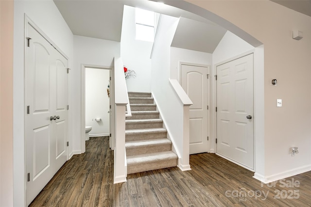 922 Bunker Trce, Rock Hill, SC 29730 - stairs featuring arched walkways, wood finished floors, and baseboards