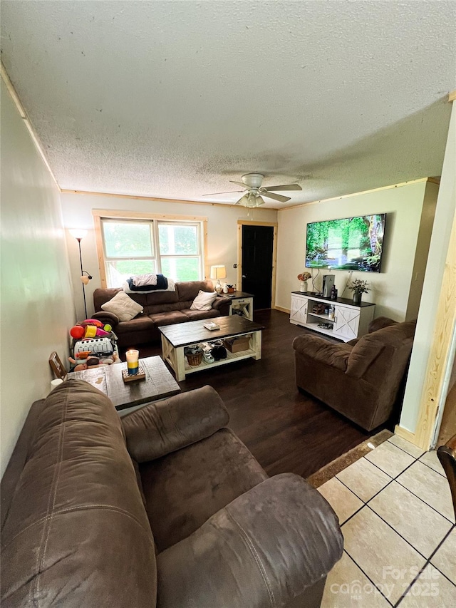 99 Boone St, Spruce Pine, NC 28777 - living room with ceiling fan, a textured ceiling, and tile patterned flooring
