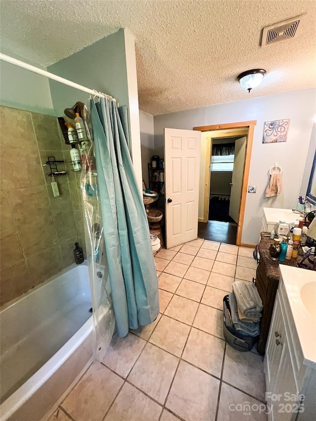99 Boone St, Spruce Pine, NC 28777 - full bath with tile patterned flooring, shower / bathtub combination with curtain, vanity, and a textured ceiling