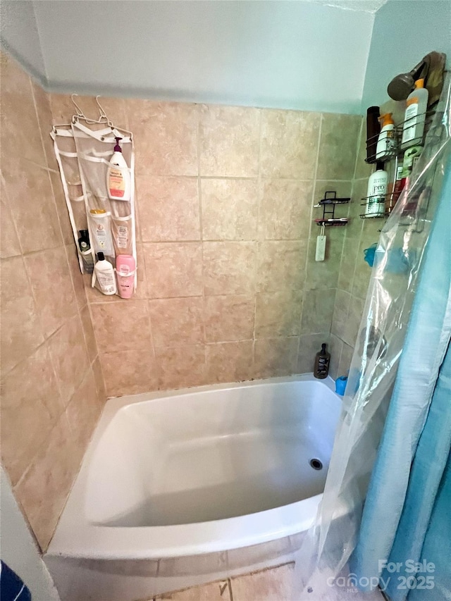 99 Boone St, Spruce Pine, NC 28777 - bathroom featuring shower / tub combo with curtain