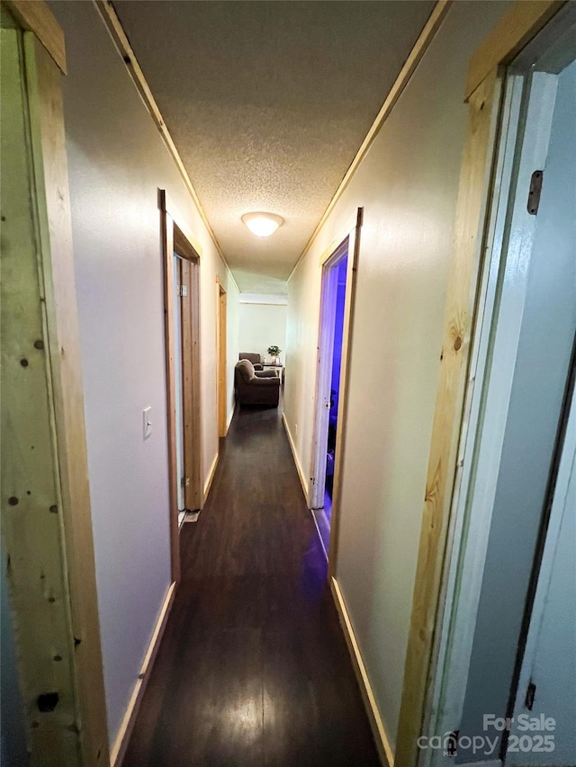 99 Boone St, Spruce Pine, NC 28777 - hallway featuring wood finished floors and a textured ceiling