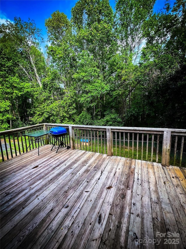 99 Boone St, Spruce Pine, NC 28777 - wooden deck featuring grilling area and an outdoor pool
