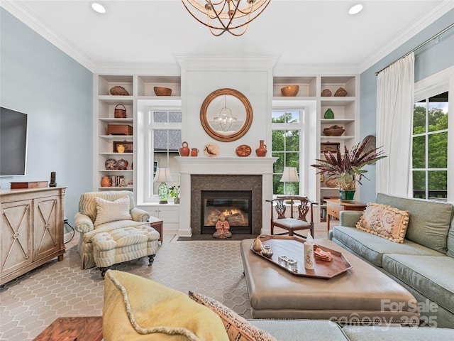 63 Chantilly Dr, Asheville, NC 28804 - living area featuring a chandelier, built in shelves, ornamental molding, plenty of natural light, and recessed lighting