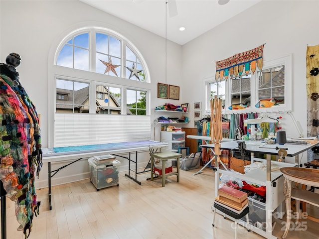 63 Chantilly Dr, Asheville, NC 28804 - home office with wood finished floors, baseboards, ceiling fan, a towering ceiling, and recessed lighting