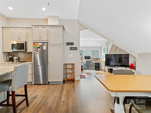 63 Chantilly Dr, Asheville, NC 28804 - kitchen featuring appliances with stainless steel finishes, wood finished floors, an office area, recessed lighting, and open floor plan