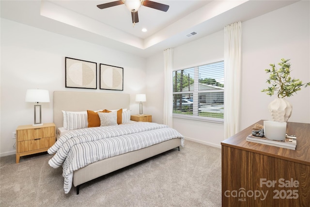 6 Bridge St, Lowell, NC 28098 - carpeted bedroom featuring baseboards, recessed lighting, a tray ceiling, and ceiling fan