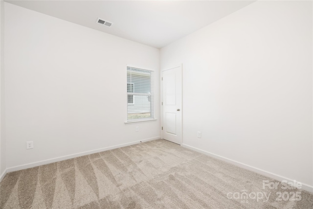 6 Bridge St, Lowell, NC 28098 - carpeted empty room with baseboards
