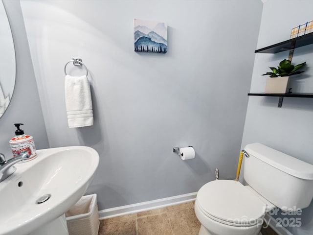 3446 Broadwick St, Charlotte, NC 28213 - half bathroom featuring baseboards, a sink, and toilet