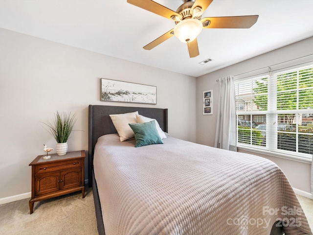 3446 Broadwick St, Charlotte, NC 28213 - bedroom with baseboards, light carpet, and a ceiling fan