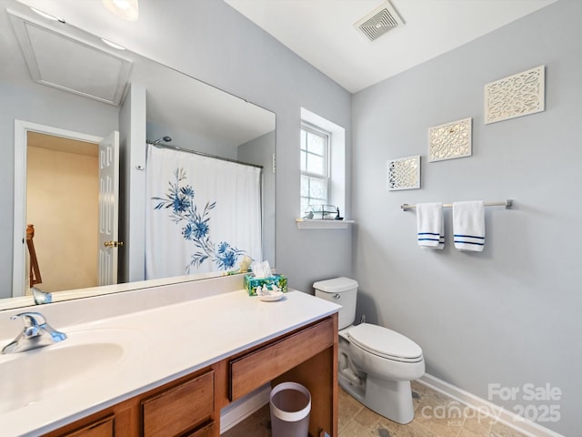 3446 Broadwick St, Charlotte, NC 28213 - full bath featuring toilet, vanity, baseboards, and tile patterned floors