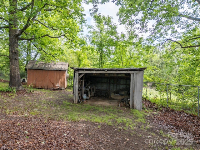 751 Ted Smith Rd, Rutherfordton, NC 28139 - view of pole building with fence and a storage shed