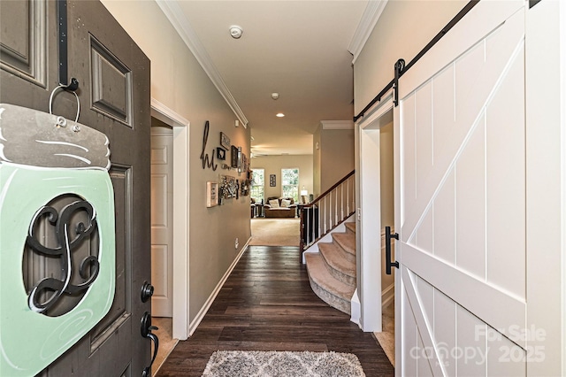 4018 Harmattan Dr, Denver, NC 28037 - entrance foyer featuring a barn door, dark wood-type flooring, ornamental molding, baseboards, and recessed lighting