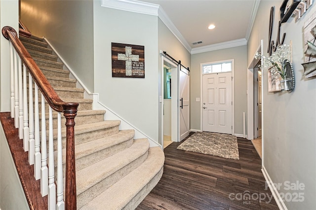 4018 Harmattan Dr, Denver, NC 28037 - foyer entrance featuring dark wood-type flooring, stairway, crown molding, baseboards, and recessed lighting