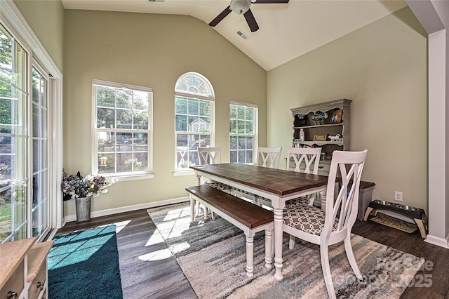 4018 Harmattan Dr, Denver, NC 28037 - dining area with ceiling fan, dark wood-type flooring, high vaulted ceiling, and baseboards